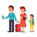 Family standing with boarding spinner wheeled bag