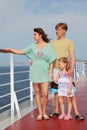 Family standing on cruise liner deck, full body Royalty Free Stock Photo