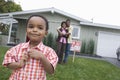 Family Standing In Front Of Their New House Royalty Free Stock Photo