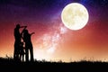 Family standing on hill and watching the moon.Celebrate Mid-autumn festival Royalty Free Stock Photo