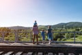 Family stands on the platform on nature background. Waiting for the train. Travel with family Royalty Free Stock Photo