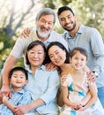 Family is the steadiest rock in the world. a happy family spending time together in a garden.