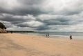 Family strolling on Takapuna beach