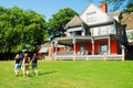 A family strolls the grounds of Sagamore Hill,