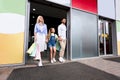 Family After Successful Shopping Holding Shopper Bags Leaving Mall Royalty Free Stock Photo