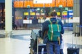 Family stands back at the airport