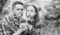 Family summer farm. daughter and father love dandelion flower. little girl and happy man dad. earth day. spring village Royalty Free Stock Photo