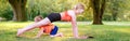 Family summer outdoor sport activity. Caucasian mother with child toddler boy doing workout yoga in park. Woman doing physical Royalty Free Stock Photo