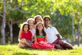 Family in summer park. Parents and kids outdoor Royalty Free Stock Photo