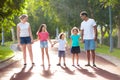 Family in summer park. Parents and kids outdoor Royalty Free Stock Photo