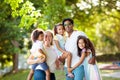 Family in summer park. Parents and kids outdoor Royalty Free Stock Photo