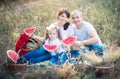 Family on a summer picnic. Watermelon and fruits