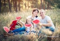 Family on a summer picnic. Watermelon and fruits