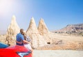 Family on car vacation. Happy couple travel by car in mountains. Royalty Free Stock Photo