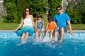 Family summer vacation, near pool Royalty Free Stock Photo