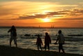 Family sunset stroll Royalty Free Stock Photo