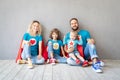 Family of superheroes playing at home Royalty Free Stock Photo