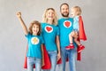 Family of superheroes playing at home Royalty Free Stock Photo