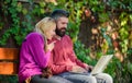 Family surfing internet for interesting content. Couple in love notebook consume content. Internet surfing concept Royalty Free Stock Photo