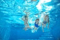 Family swim in pool or sea underwater, mother and children have fun in water Royalty Free Stock Photo