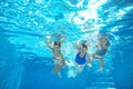 Family swim in pool or sea underwater, mother and children have fun in water Royalty Free Stock Photo