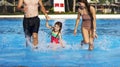 Family Swimming Pool Playing Togetherness Summer Holiday