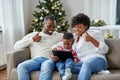 family with tablet pc has video call on christmas Royalty Free Stock Photo