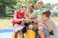 Family taking home a dog from the animal shelter giving new home Royalty Free Stock Photo