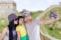 Family taking picture on Great Wall of China Royalty Free Stock Photo