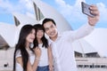 Family taking picture in sydney