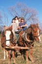 A family taking a ride on horses and wagon, Central MO Royalty Free Stock Photo