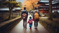Family of three with backpack travel at temple in Japan