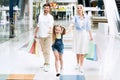 Family Of Three Doing Shopping Walking In Mall Royalty Free Stock Photo