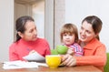 Family of three generation calculates the budget