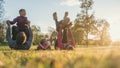 Family with three kids having fun in autumn park Royalty Free Stock Photo