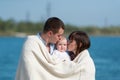 The family of three people has a rest outdoors Royalty Free Stock Photo