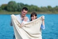 The family of three people has a rest outdoors Royalty Free Stock Photo