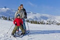 Family of three people learns skiing together Royalty Free Stock Photo