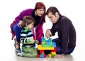 Family of three playing lego Royalty Free Stock Photo