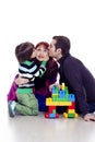 Family of three playing lego Royalty Free Stock Photo