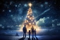 Family of three standing in front of Christmas tree with lights.