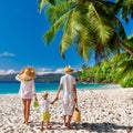 Family with three year old boy on beach. Seychelles, Mahe Royalty Free Stock Photo