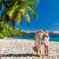 Family with three year old boy on beach. Seychelles, Mahe Royalty Free Stock Photo