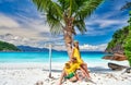 Family with three year old boy on beach. Seychelles, Mahe Royalty Free Stock Photo