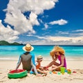 Family with three year old boy on beach Royalty Free Stock Photo