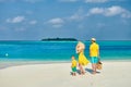 Family with three year old boy on beach Royalty Free Stock Photo