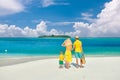 Family with three year old boy on beach Royalty Free Stock Photo