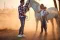 Family time on countryside.Smiling family with girl petting horses