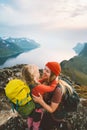Family time Mother hiking with daughter in mountains travel in Norway together active healthy lifestyle vacations