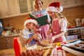 Family time- preparing Christmas cookies Royalty Free Stock Photo